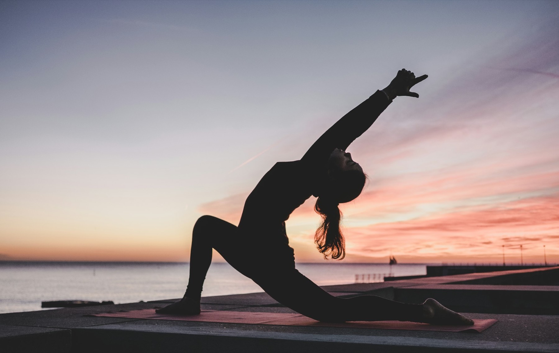 An evening yoga practice by the water